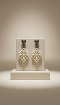 Ivory motif drop earrings
